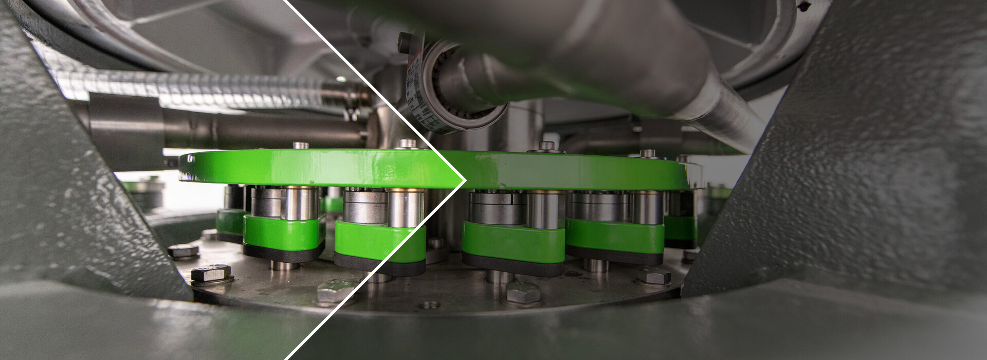 Nahaufnahme eines maschinellen Teils mit grünen und metallischen Komponenten